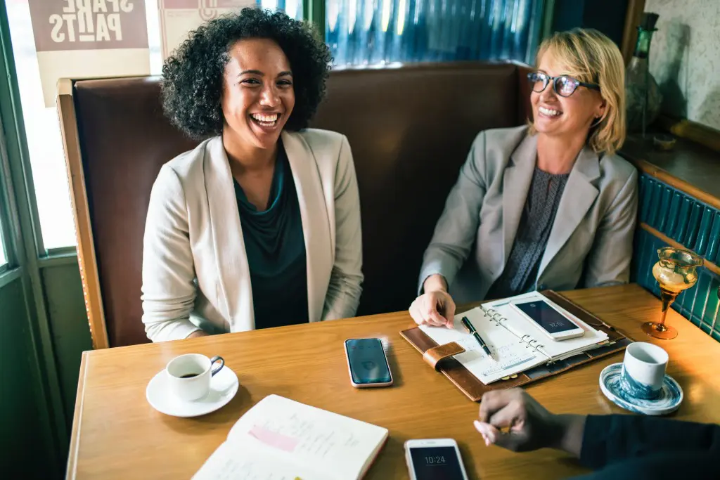 Women talking at a networking lunch