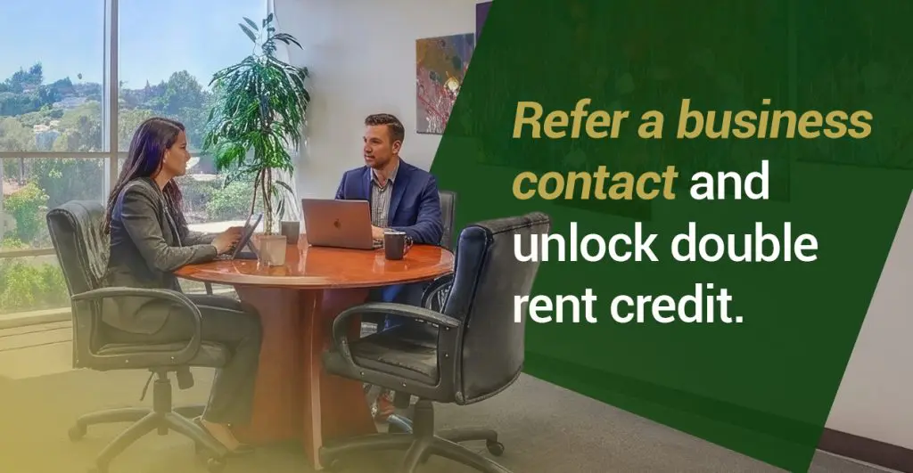 Barrister Suites Office Lease Two people in business attire sit at a round table in a modern office with large windows and artwork. Text reads: Refer a business contact and unlock double rent credit.