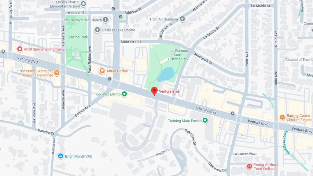 Barrister Suites Office Lease A digital map displays Ventura Blvd in Encino, Los Angeles, with nearby landmarks including parks, cafes, shops, and clinics. Streets and local businesses are labeled, and a red pin marks a location on Ventura Blvd.