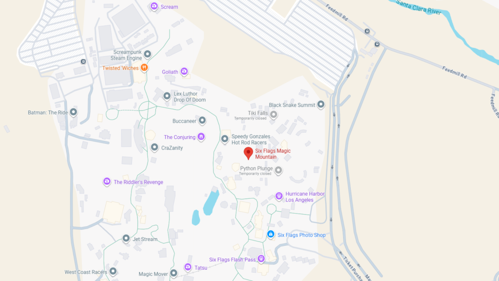 Barrister Suites Office Lease A map of an amusement park shows labeled attractions, ride icons, pathways, and surrounding roads. Locations include Six Flags Magic Mountain, Hurricane Harbor, and rides like Goliath, Batman: The Ride, and The Riddlers Revenge.