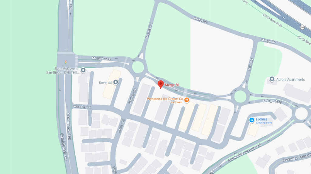 Barrister Suites Office Lease A map showing Merge Ave intersecting with Merge 56. Locations marked include Wynnstars Ice Cream Co, Kenxi XI, and Formes Clothing Store. Nearby roads and buildings are visible, along with a roundabout.