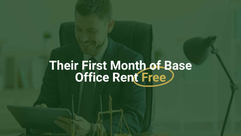 Barrister Suites Office Lease A man in a suit sits at a desk using a tablet. Text over the image reads, Their First Month of Base Office Rent Free, with Free highlighted in a yellow circle.