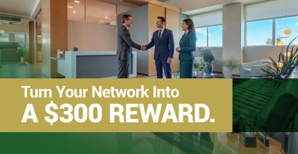 Barrister Suites Office Lease Two men in suits shaking hands while a woman stands nearby in a modern office, with text reading Turn Your Network Into A $300 REWARD.