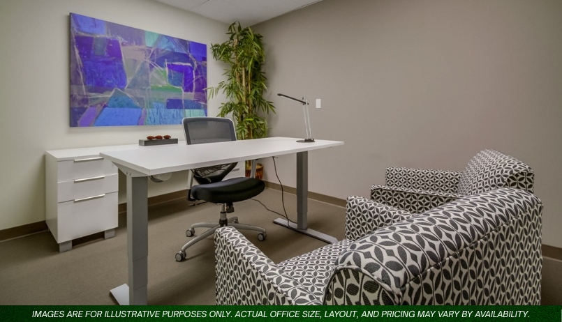Barrister Suites Office Lease A modern office with a white desk, black office chair, patterned armchairs, a side cabinet, a potted plant, and a colorful abstract painting on the wall. Text at the bottom notes the image is for illustrative purposes.